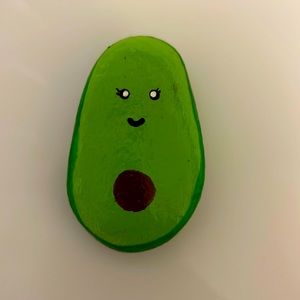 Avocado painted rock